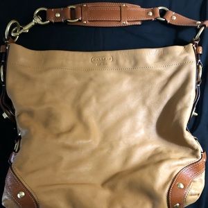 Coach large leather hobo shoulder bag with heavy gold hardware.